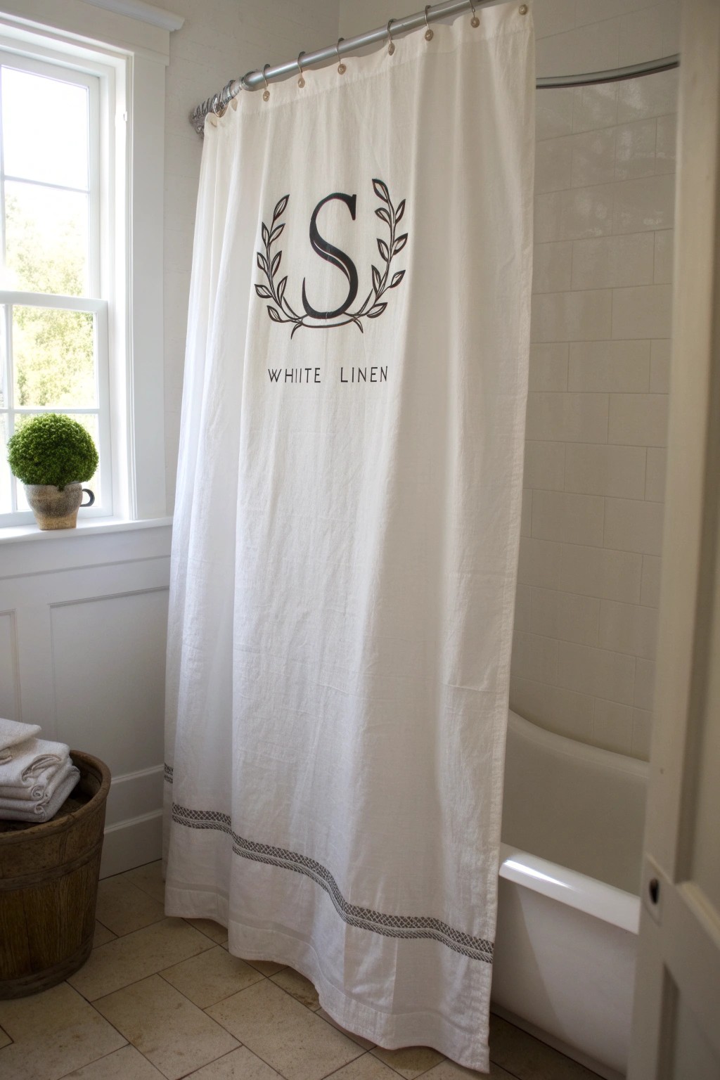 Elevate your bathroom with a beautifully monogrammed shower curtain—simple, custom, and effortlessly chic.