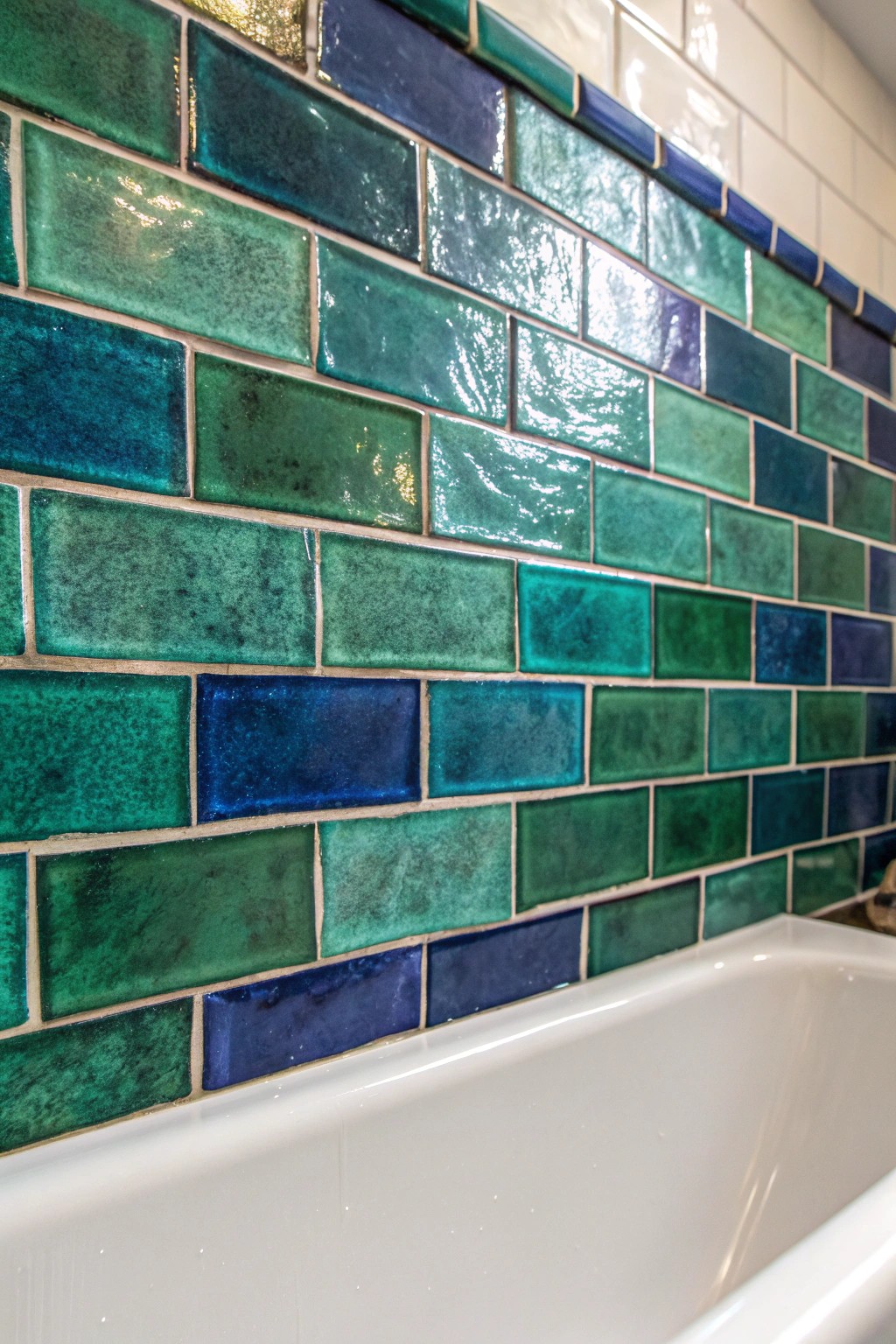 Add a pop of glamour to your bath with glossy jewel-toned tiles.