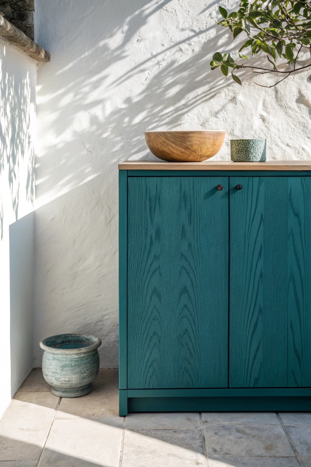 Bold teal cabinetry: a simple statement for modern kitchen charm.