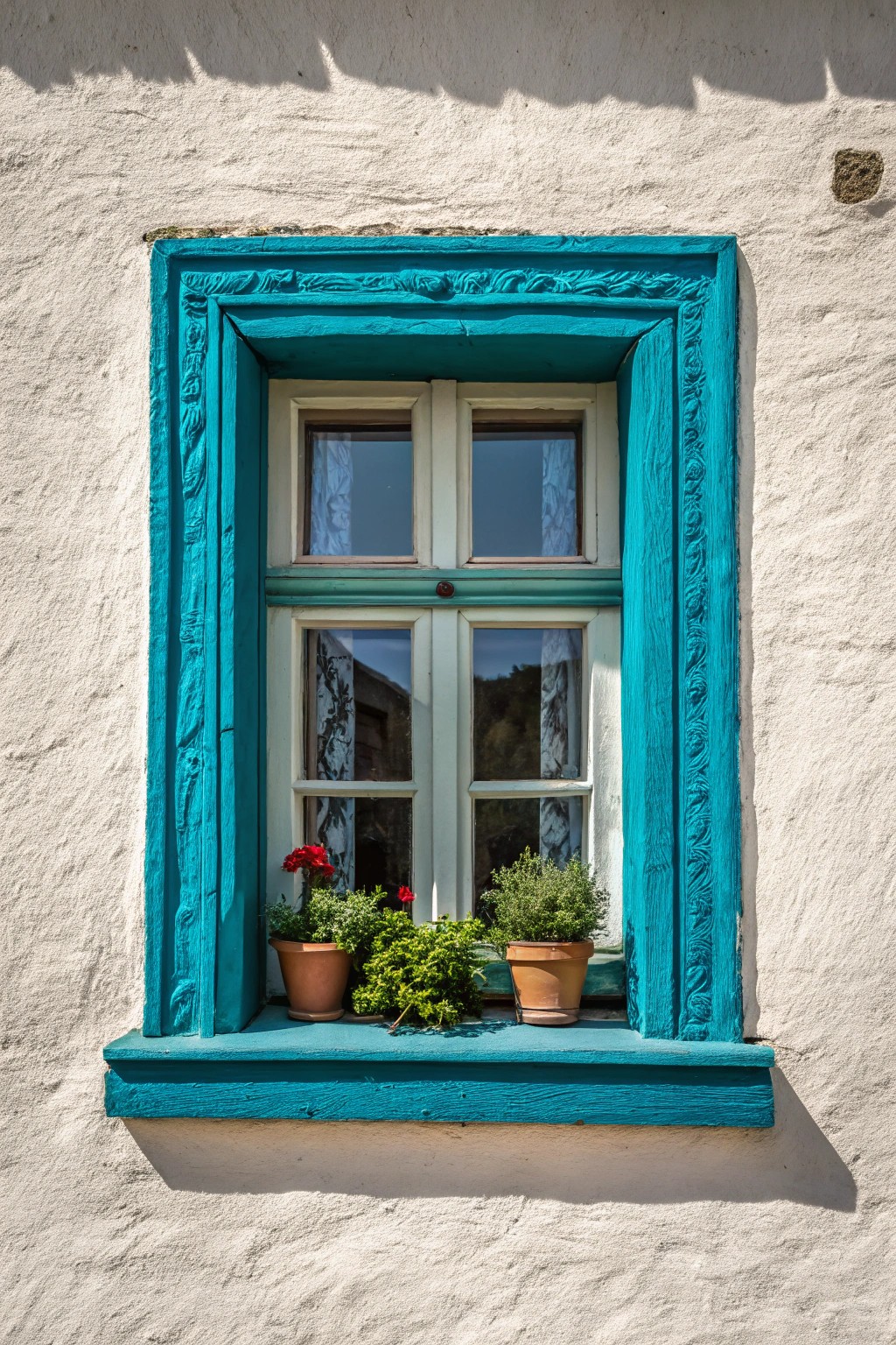 Elevate your exterior with a pop of bold trim color—where artistry meets simplicity.