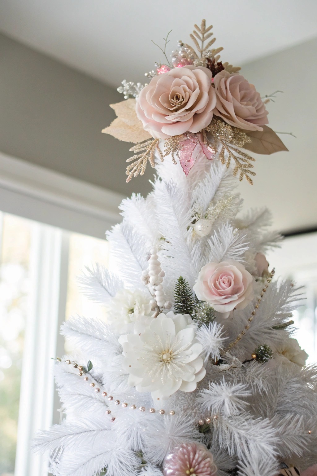 Make a statement with an oversized floral tree topper—where natural beauty meets holiday magic.