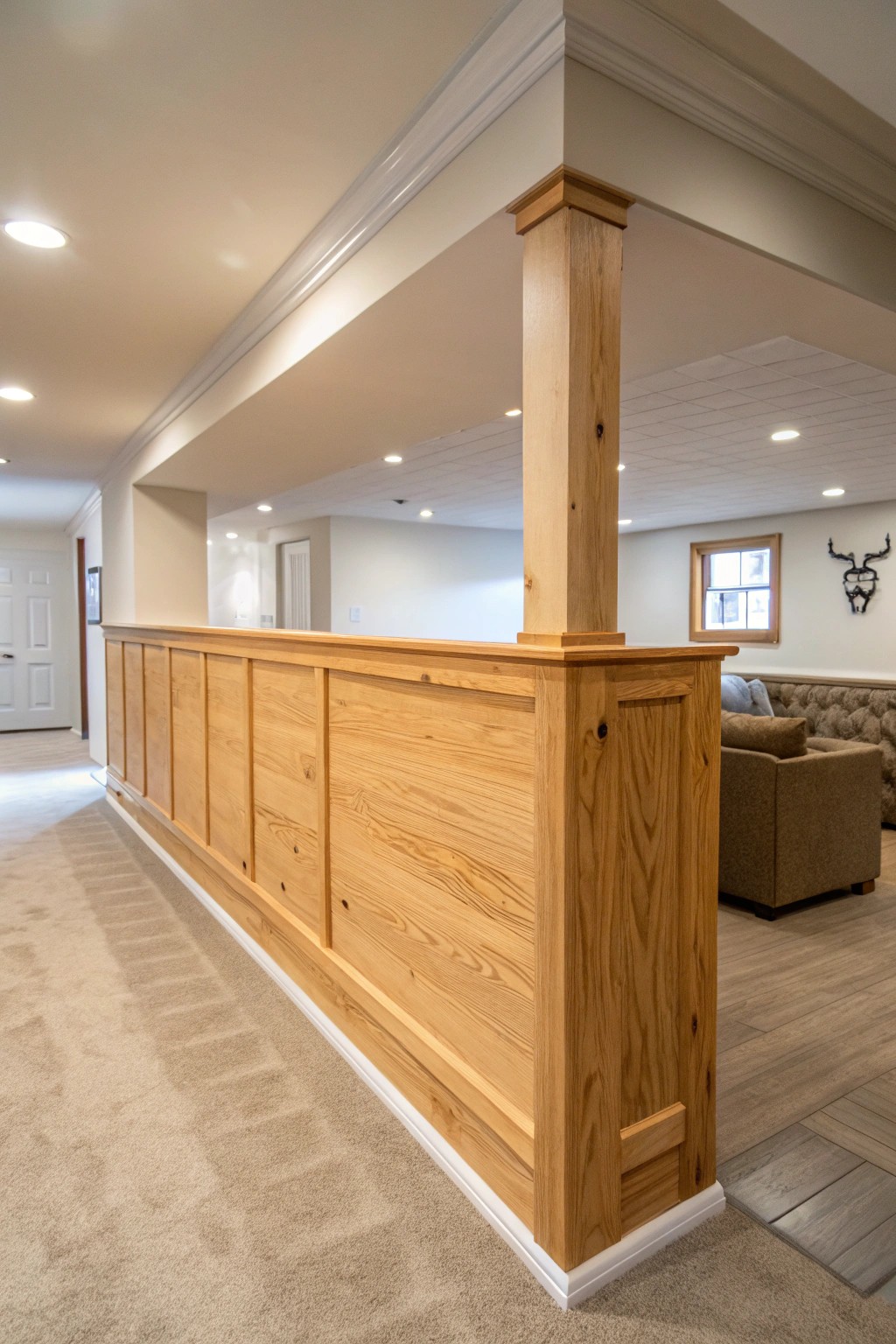 A handcrafted half wall defines open spaces—versatile simplicity for your finished basement.