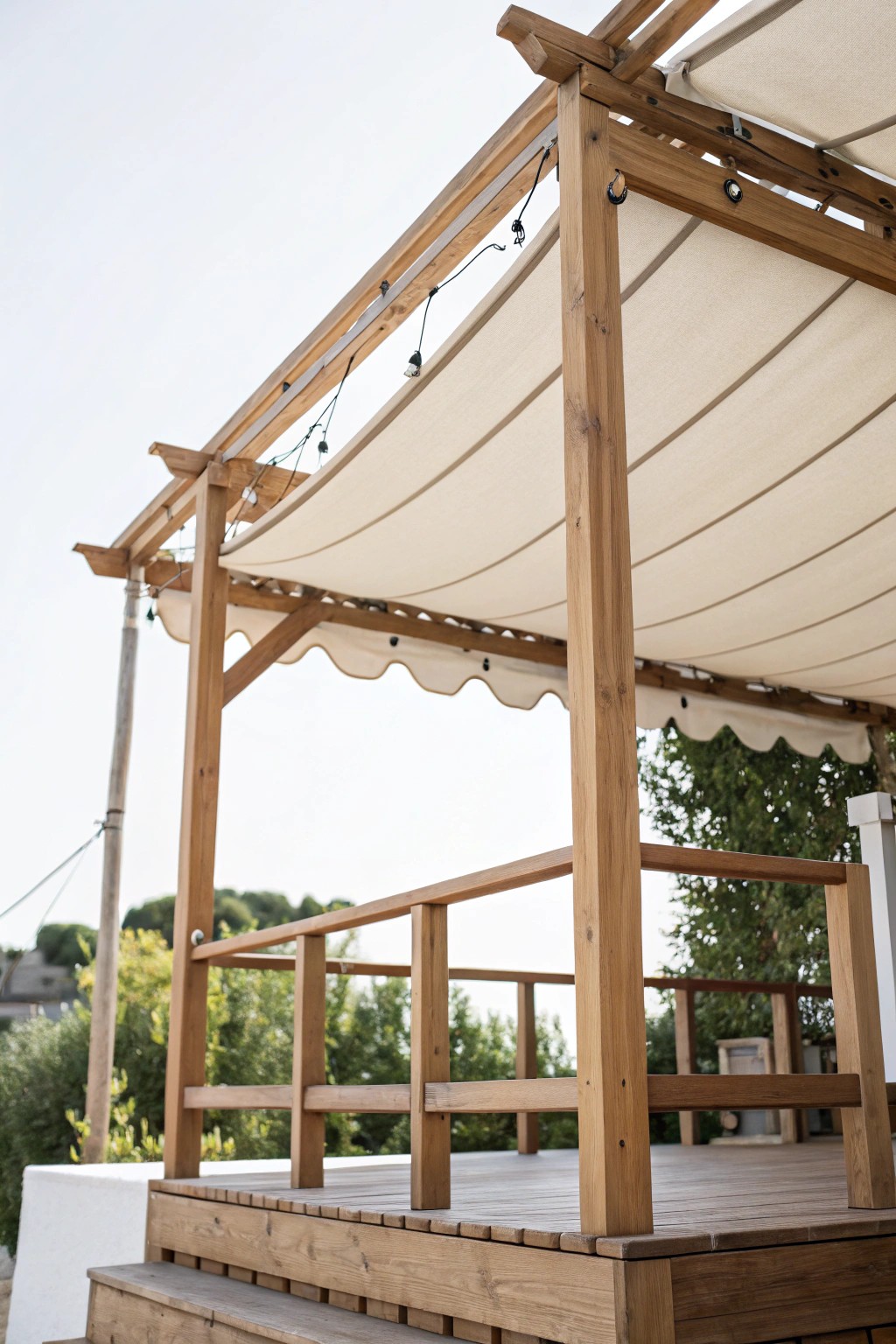 Effortless elegance: a retractable canopy brings flexible shade and natural style to your deck.