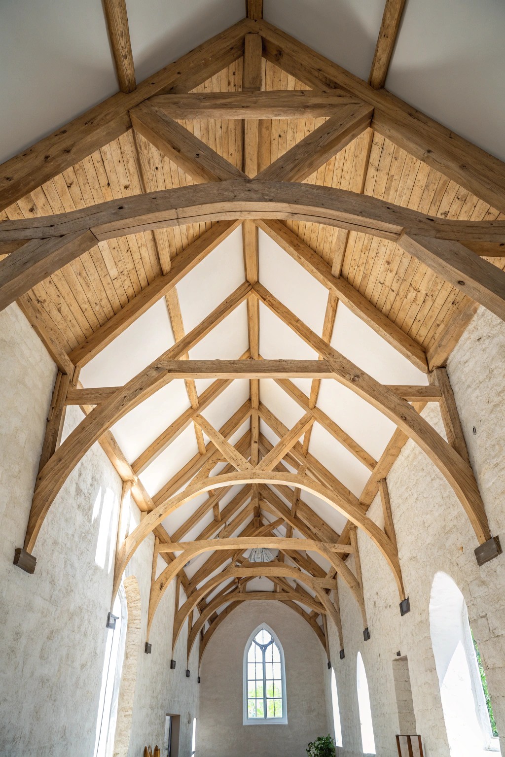Elevate your space with the timeless charm of a rustic arched truss.