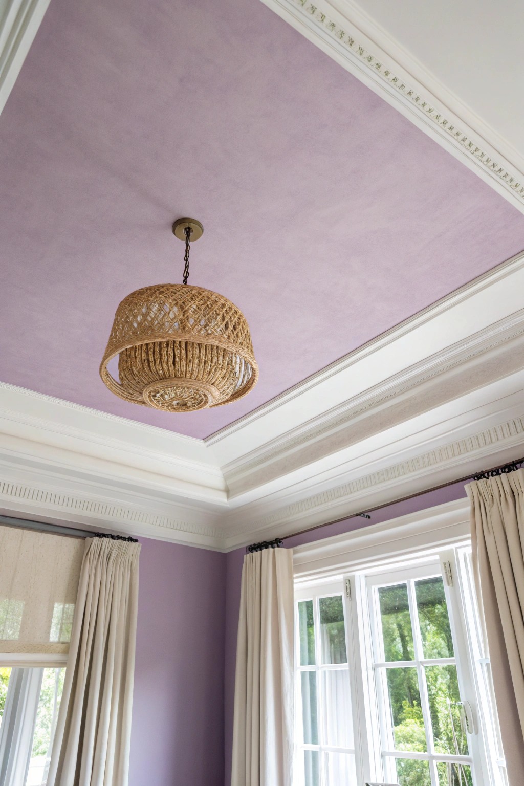 Make a statement with a dreamy violet ceiling—where bold meets serene simplicity.