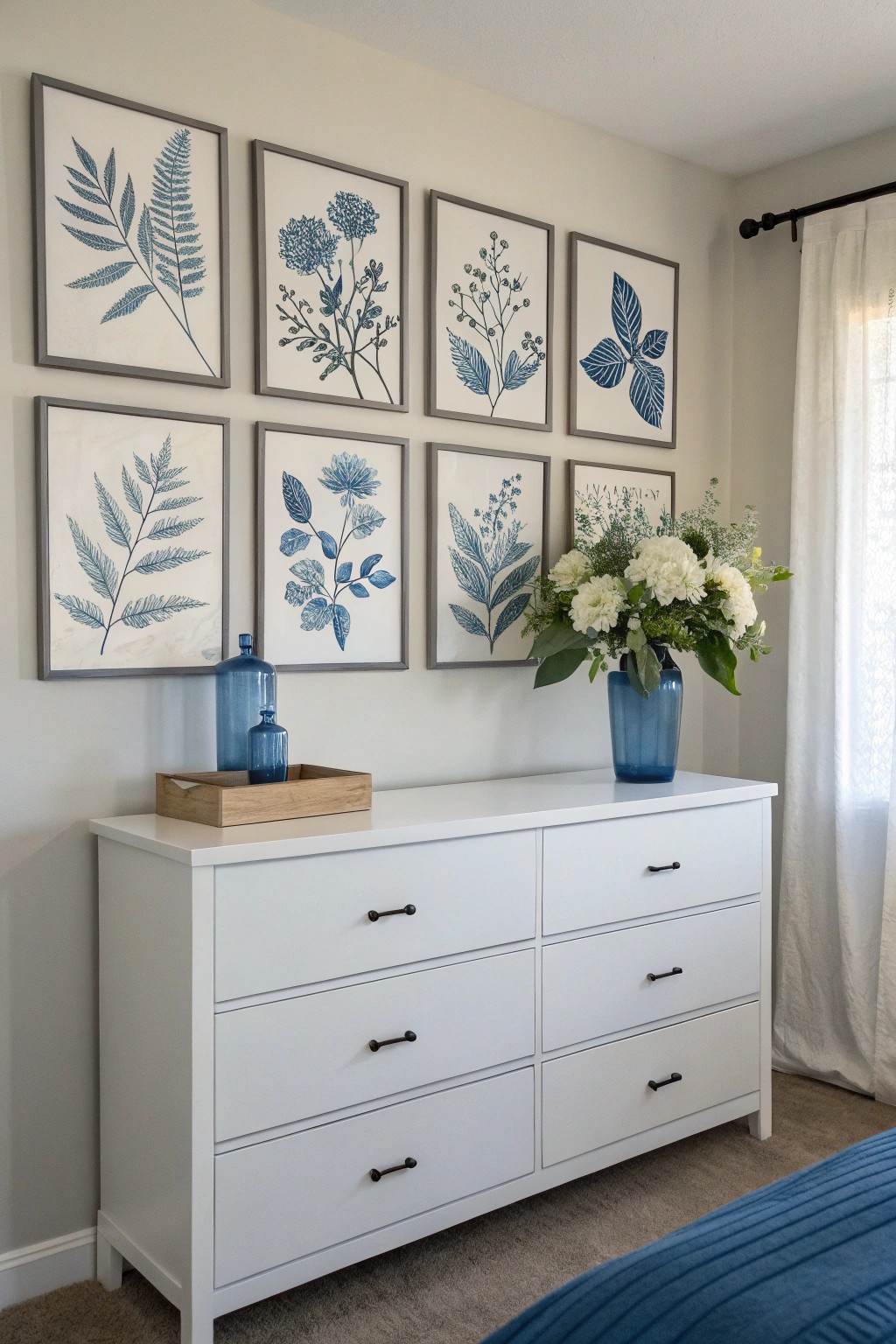 Blue botanical artwork infuses the space with natural tranquility and style.