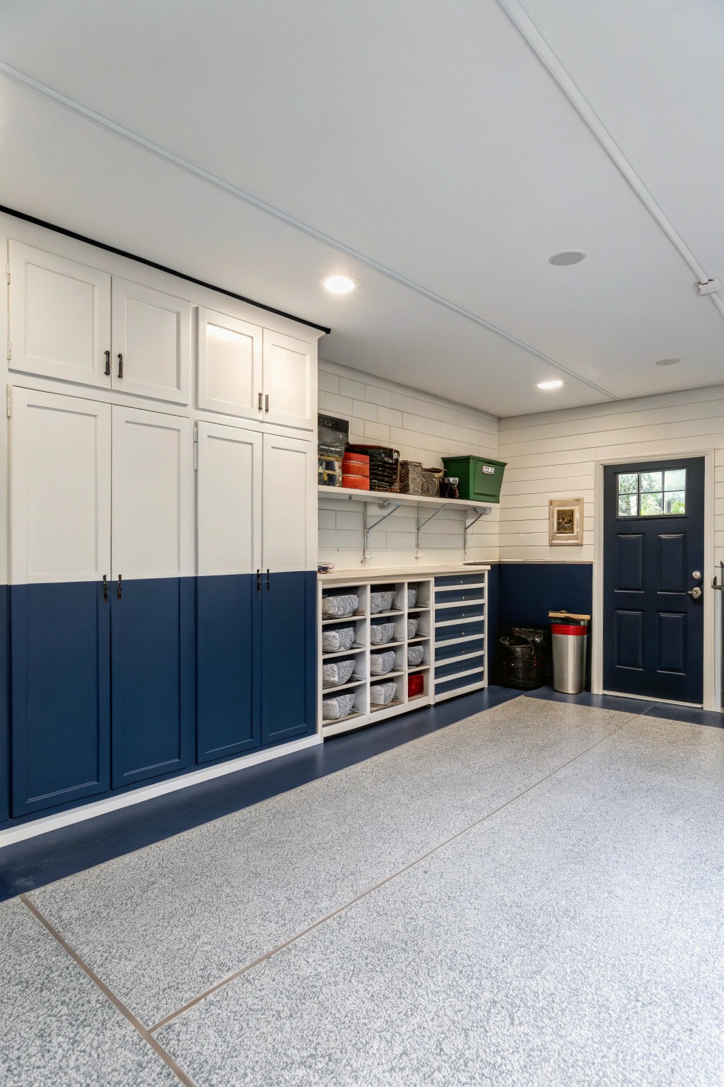 A two-tone paint job adds depth and practical elegance to garage walls.