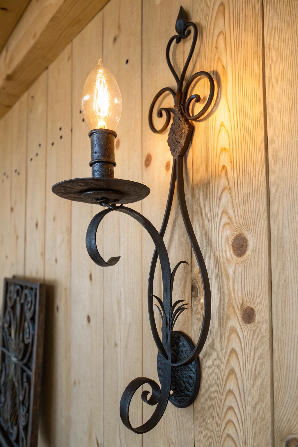 Elevate your western bedroom with sculptural wrought iron lighting for timeless charm.