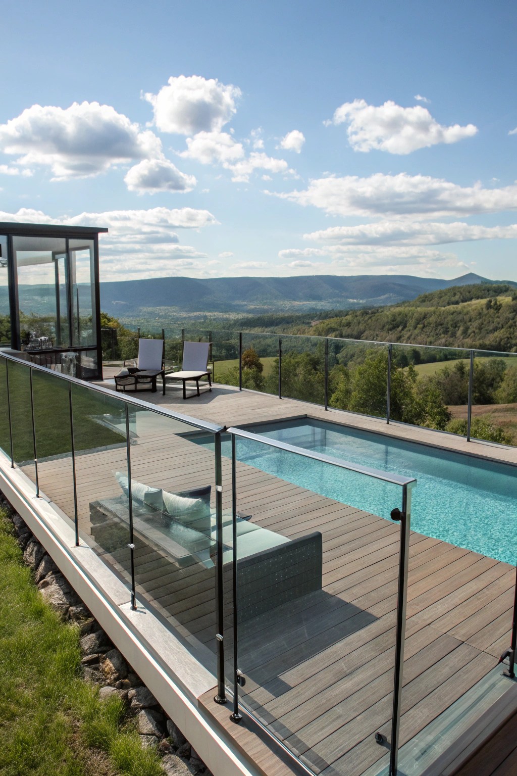 Glass railings keep your view and make every sunset poolside spectacular.